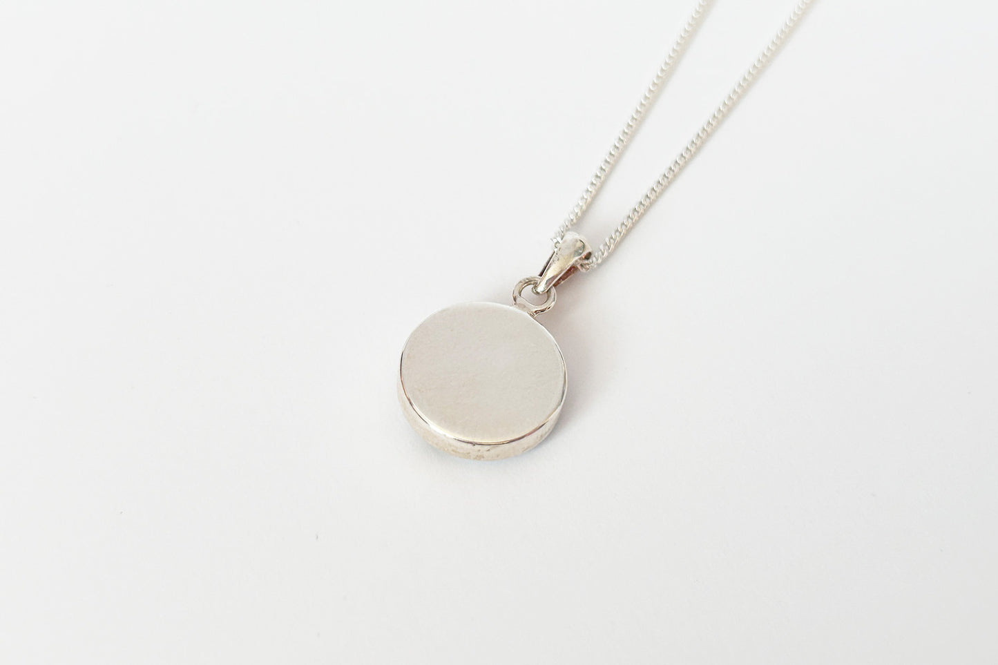 Sterling silver chain with seashell pendant