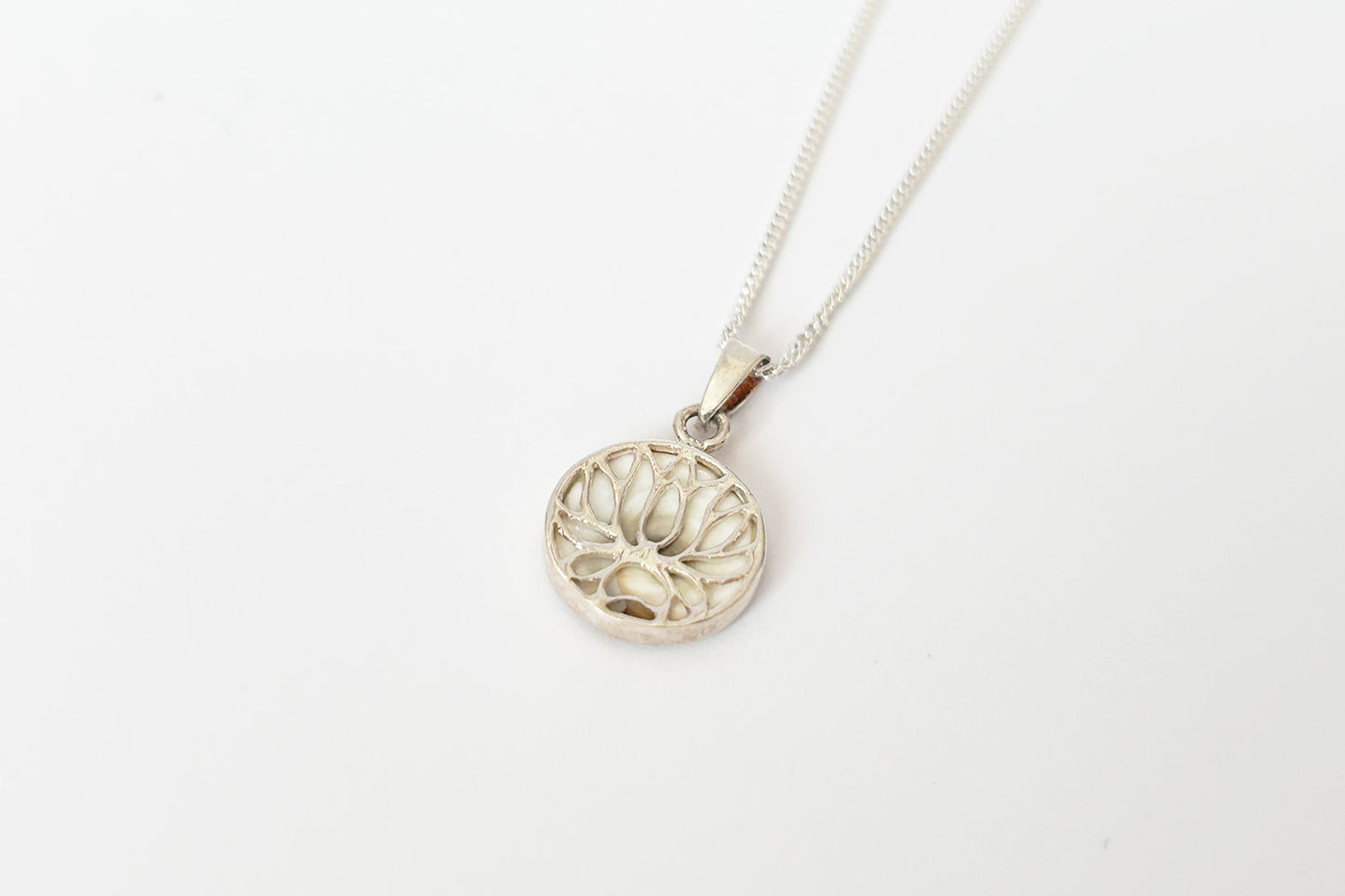 Sterling silver chain with seashell pendant