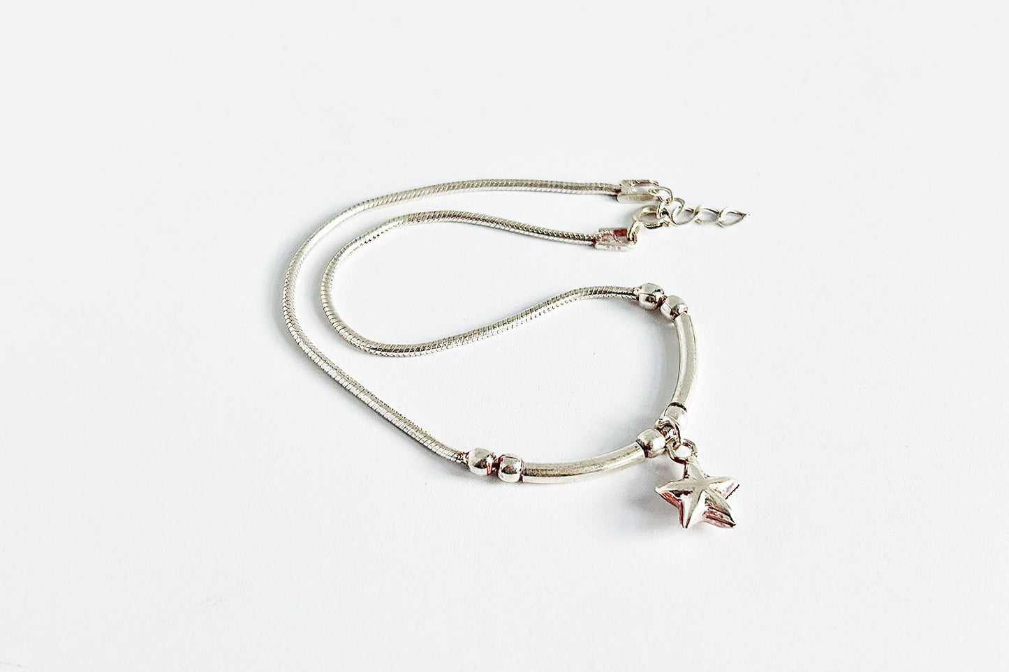Sterling silver anklet with a star