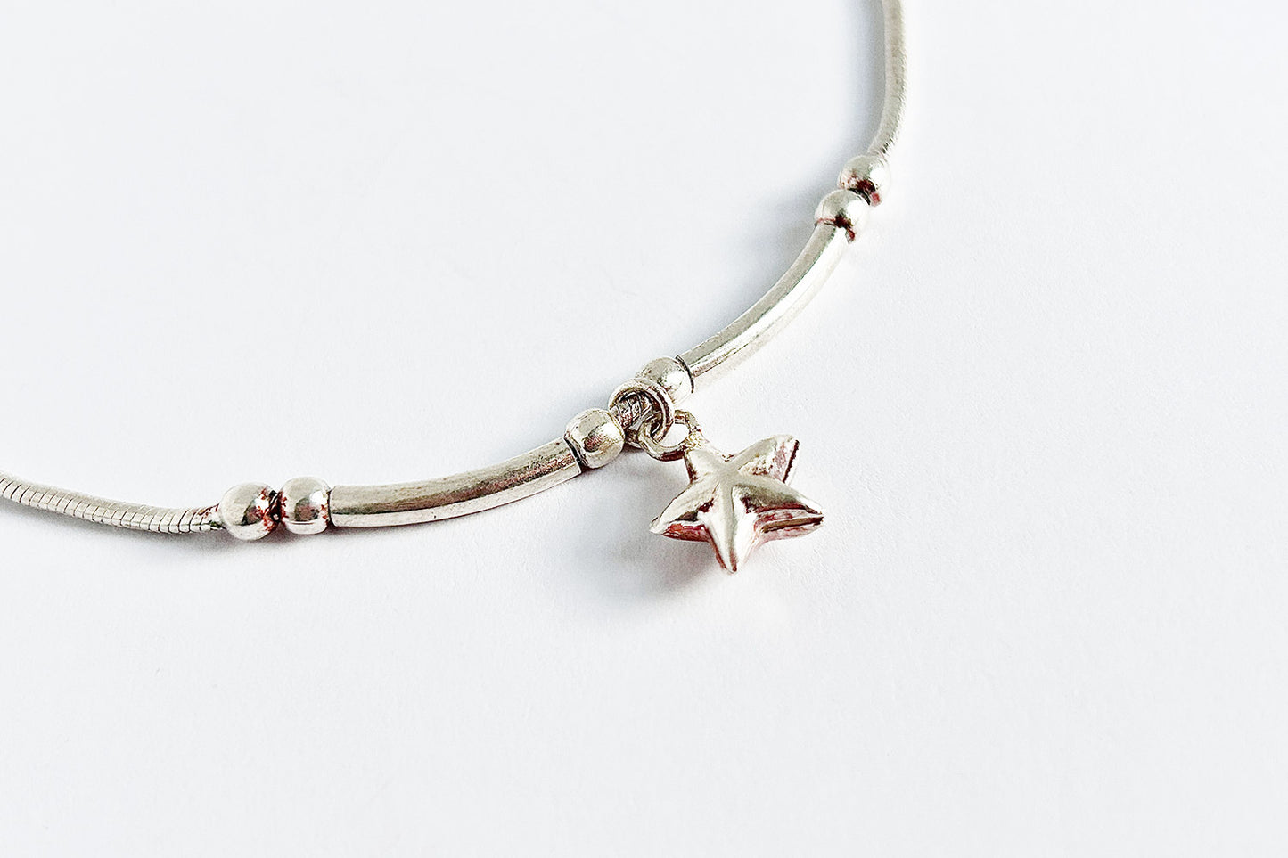 Sterling silver anklet with a star